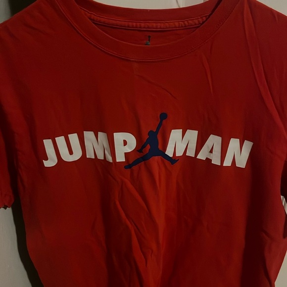 Red shirt with blue jump man letters - Picture 1 of 4